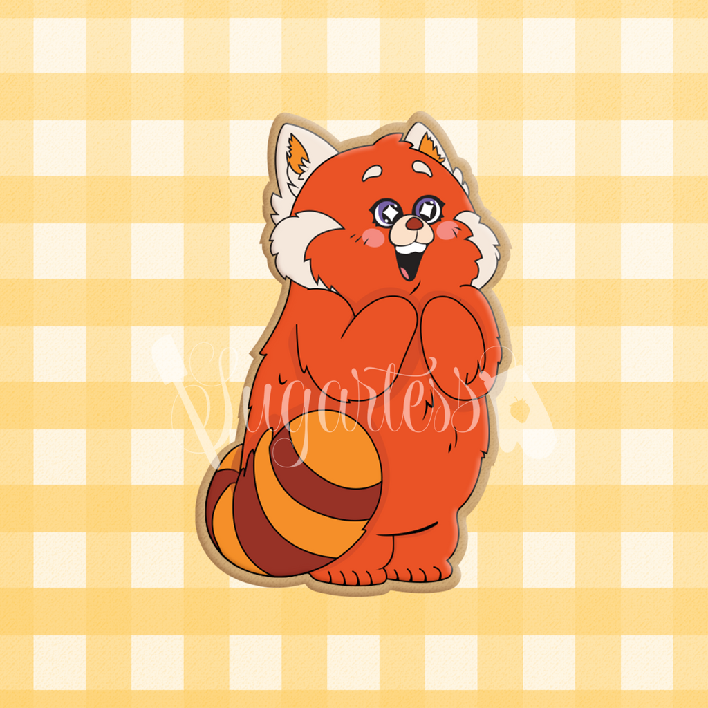 Sugartess cookie cutter in shape of thrilled red panda character standing.