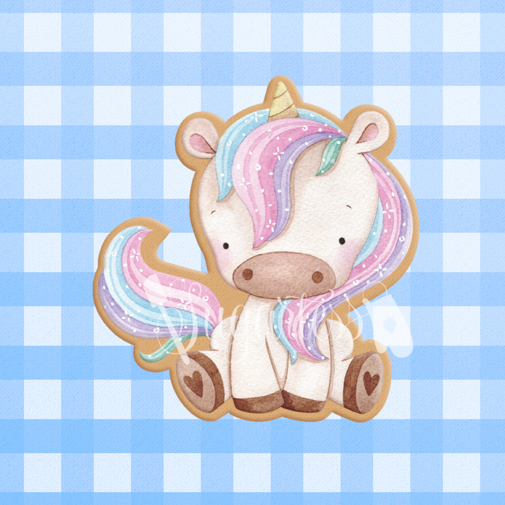 Sugartess custom cookie cutter in shape of sitting unicorn.