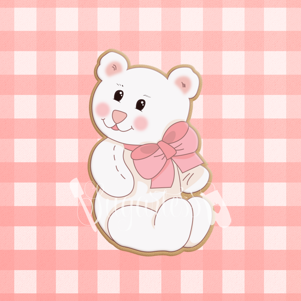 Sugartess custom cookie cutter in shape of a white teddy bear with large neck bow.