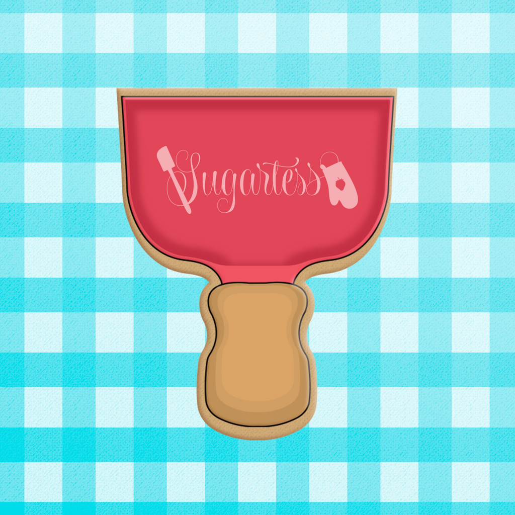Sugartess custom cookie cutter in shape of a red chubby big cookie spatula.