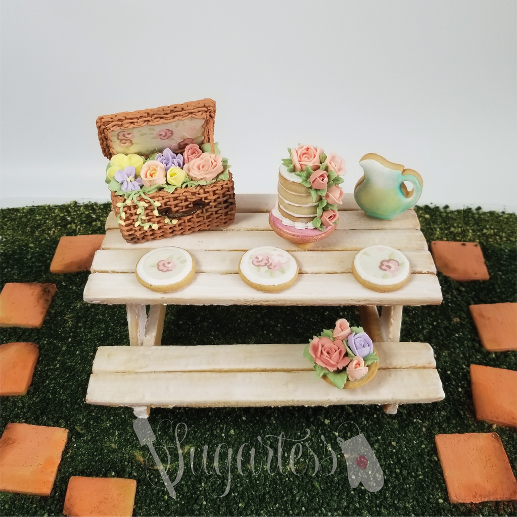 Sugartess custom cookie cutter sets for 3-D picnic table cookie and cookie accessories: 3-D picnic basket, mini pitcher, and mini 3-D round cake with base.