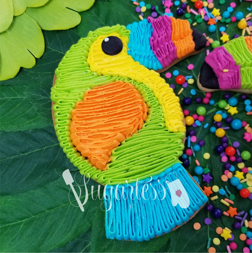 Sugartess fiesta cookie cutter in shape of a toucan bird piñata.