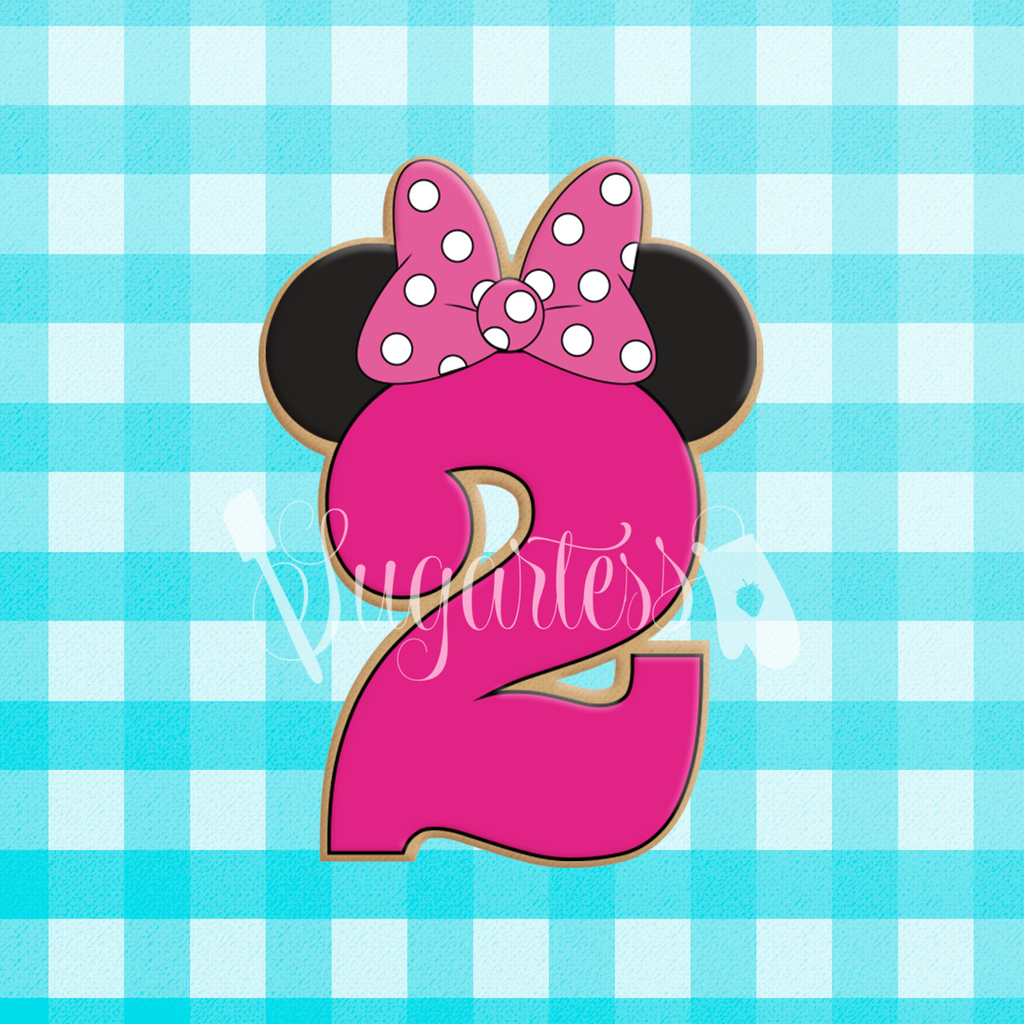 Sugartess custom cookie cutter in shape of birthday number 2 with girl mouse ears and head bow on top.